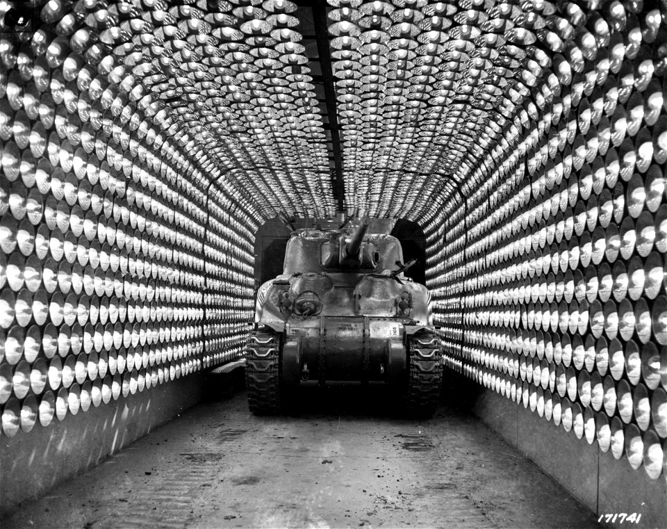 SC 171741 - For protection against the elements, tanks are painted before shipment overseas at the Chester Tank Depot, Army Ordnance Department.