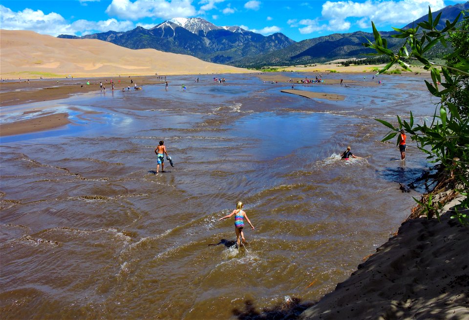 Overview of Medano Creek and Children Playing