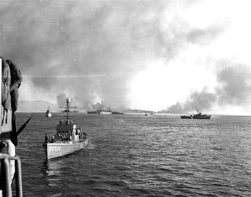 SC 180046 - Invasion fleet nears Italian shore, below Salerno, under protective smoke screen laid down by U.S. and British destroyer. 18 September, 1943.