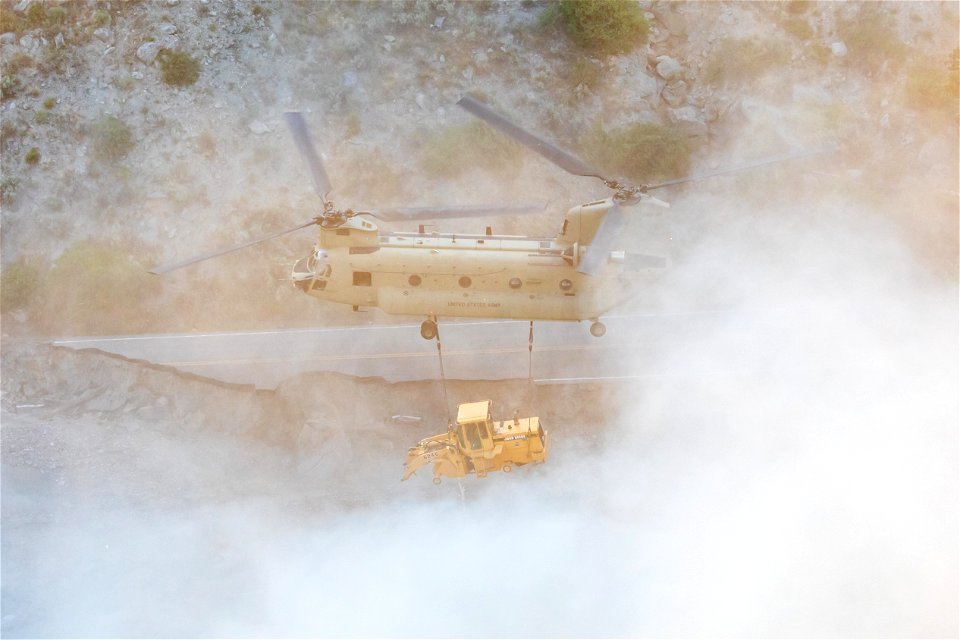 Yellowstone Flood Recovery: Loader removal from North Entrance Road in Gardner Canyon by the Montana Army National Guard