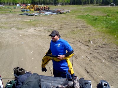 2012 SCA Fisheries Intern Matt Ouano - Suiting up to check the weir