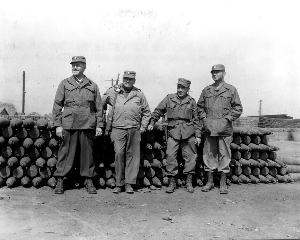 SC 364046 - (L to R) Col. G. A. Hess, Sunnyvale, Calif., 83rd Ord. Bn.; Lt. Col. H. W. Wurtzler, Springfield, Ill., I Corps; Maj. J. H. Carney, Taunton, Miss., I Corps, and Capt. L. J. Brand, La Grange, Ga., 25th Div...