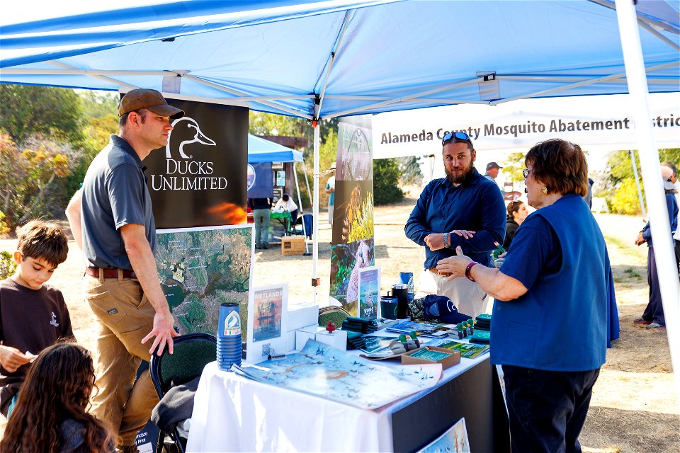 Attendees engage with partner booths