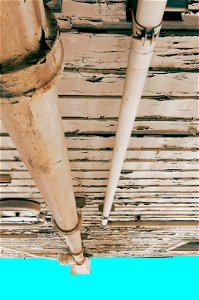 Wall, pipes, peeling paint