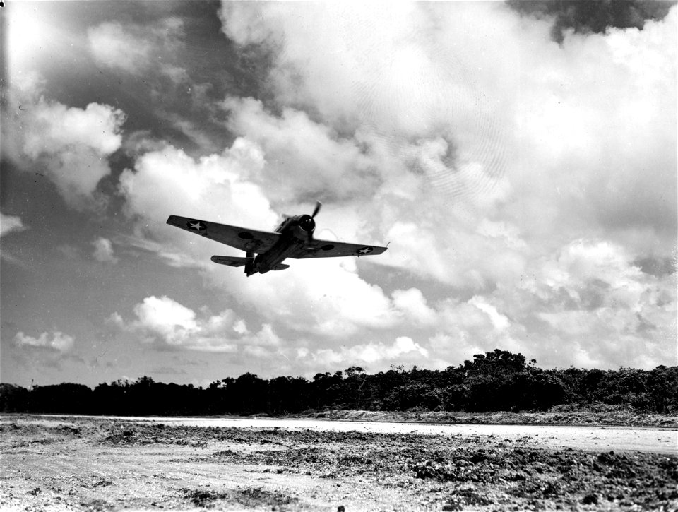 A warbird takes off for battle. Guadalcanal. February, 1943.