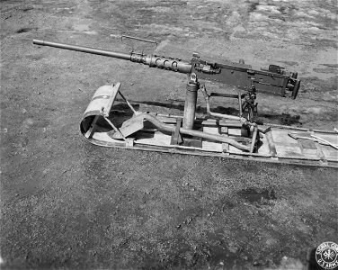 SC 364488 - .50 caliber heavy machine gun mounted on 18" toboggan with pioneer equipment strapped on.