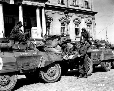 SC 329695 - The first meeting of American troops of General Patton's Third U.S. Army forces with French troops of General Patch's Seventh U.S. Army took place recently when their long reconnaissance arms met at Autun, France. photo