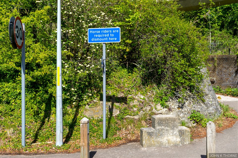 Horse riders are required to dismount here.