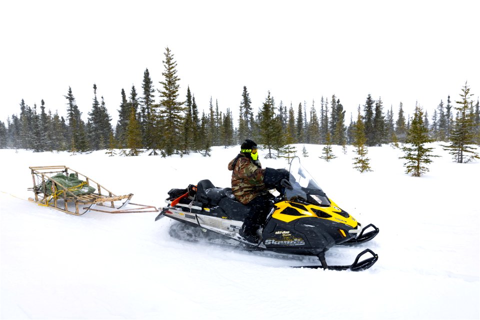 Snowmachine on the winter trail.