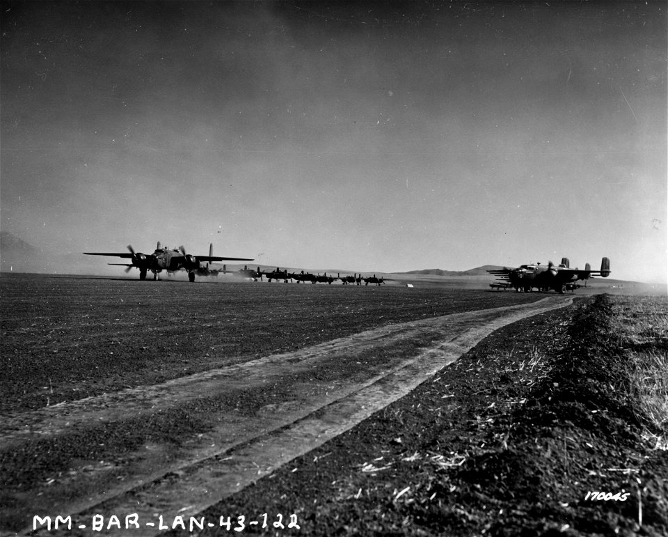SC 170045 - B-25 bombers taking off for a raid. Berteux, North Africa. 12 February, 1943. photo