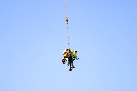 Yellowstone Helitack short-haul training: crew hauling patient to safety (4)