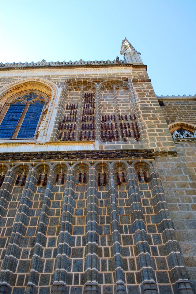 Actual chains used to imprison Christians abroad on the side of the Monasterio de San Juan de los Reyes