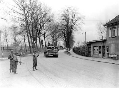 SC 337273 - 9th U.S. Army tanks roll up to the bridge near the Rhine River, Germany. 31 March, 1945.