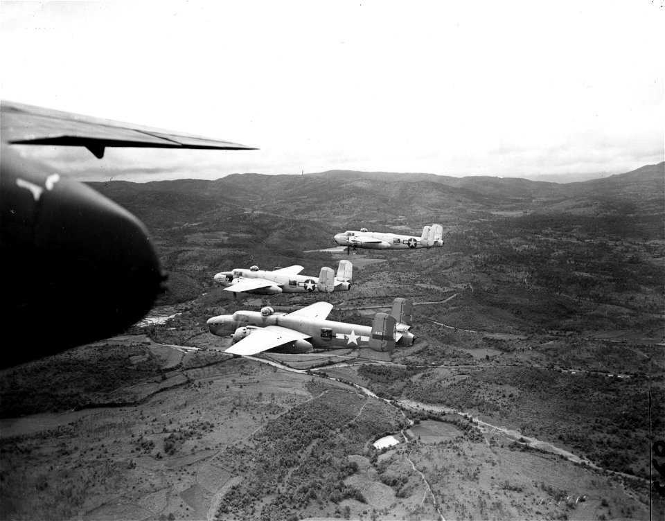 SC 221717 - Flying in formation these three B-25s of the 341st Bombardent Group, 14th U.S. Army Air Force...