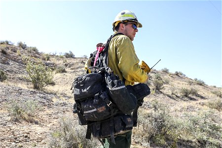 MAY 18 A firefighter with fire pack photo