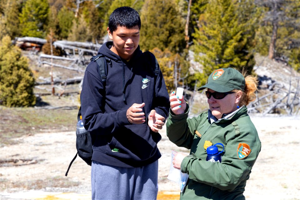 St. Stephens student helps with a geyser demonstration