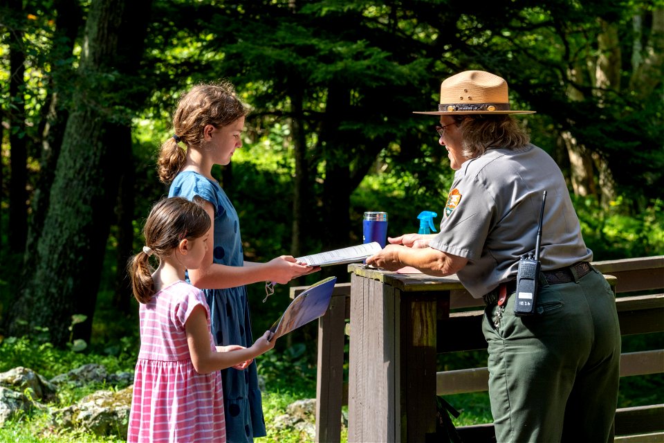 Young Visitors Speak with Ranger Mara photo