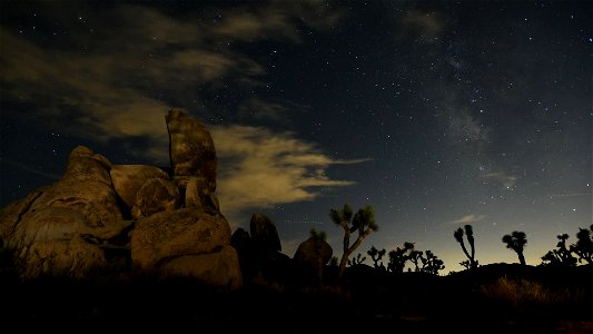 Stars and Clouds Over Headstone Rock photo