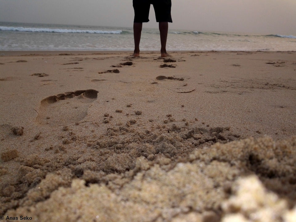 Beach sand man photo