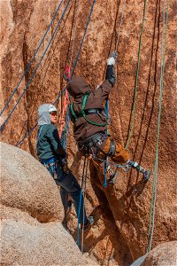 Disabled Climber and Climbing Instructor