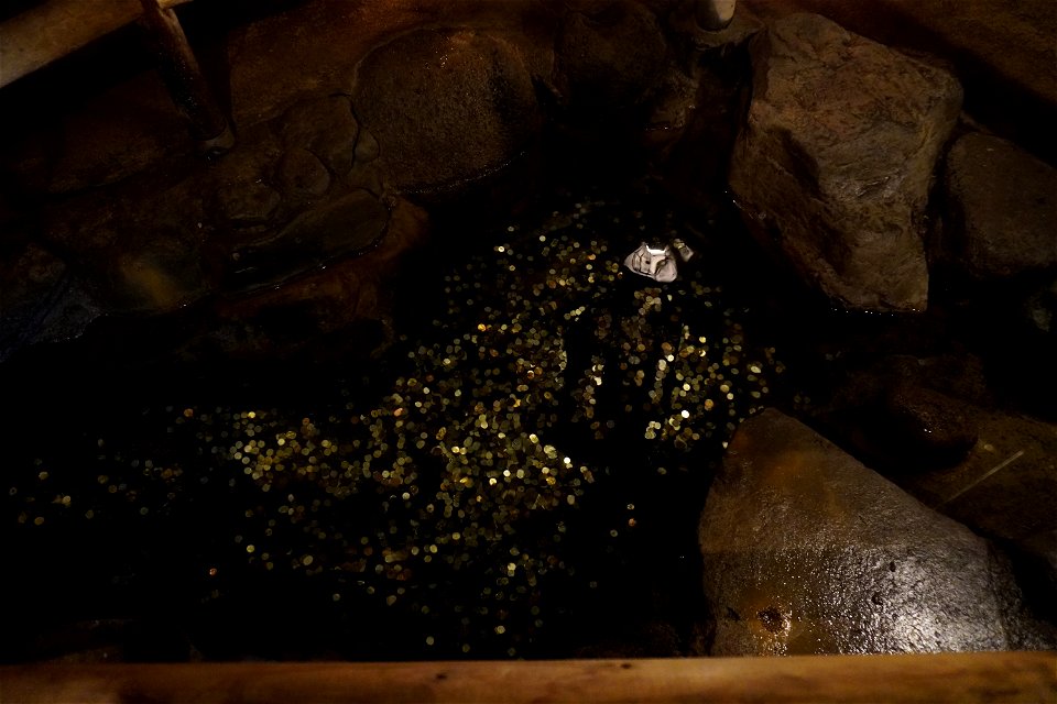 Coins in the cave photo
