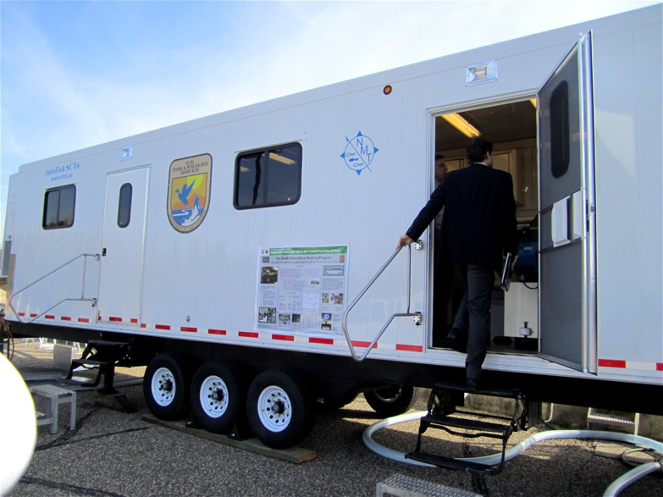 Congressional staffer entering Autofish system trailer