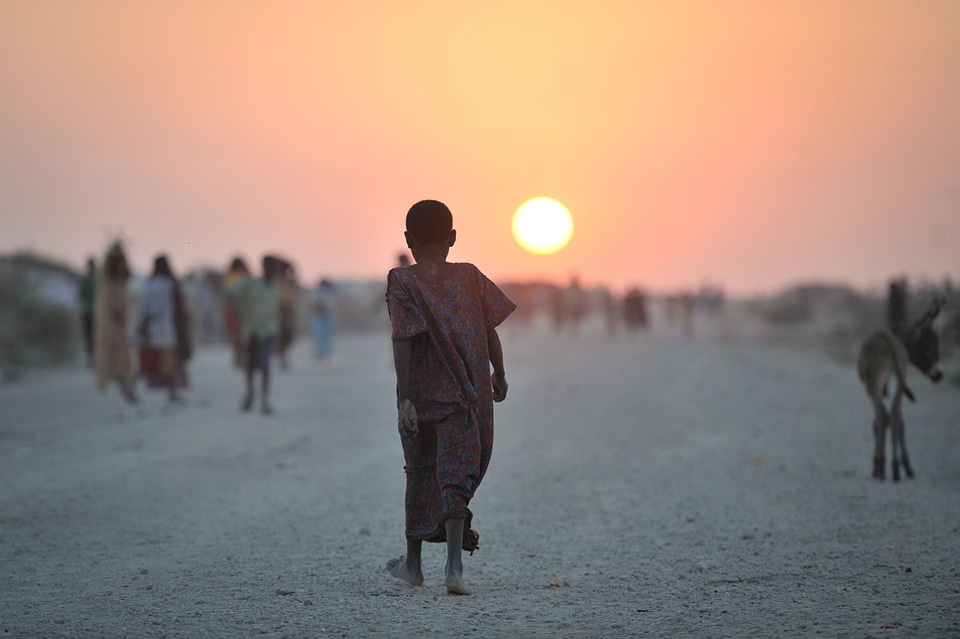 Boy sunset dusk photo