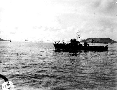 SC 364357 - A gun boat in foreground, and a smoke screen can be seen in background.