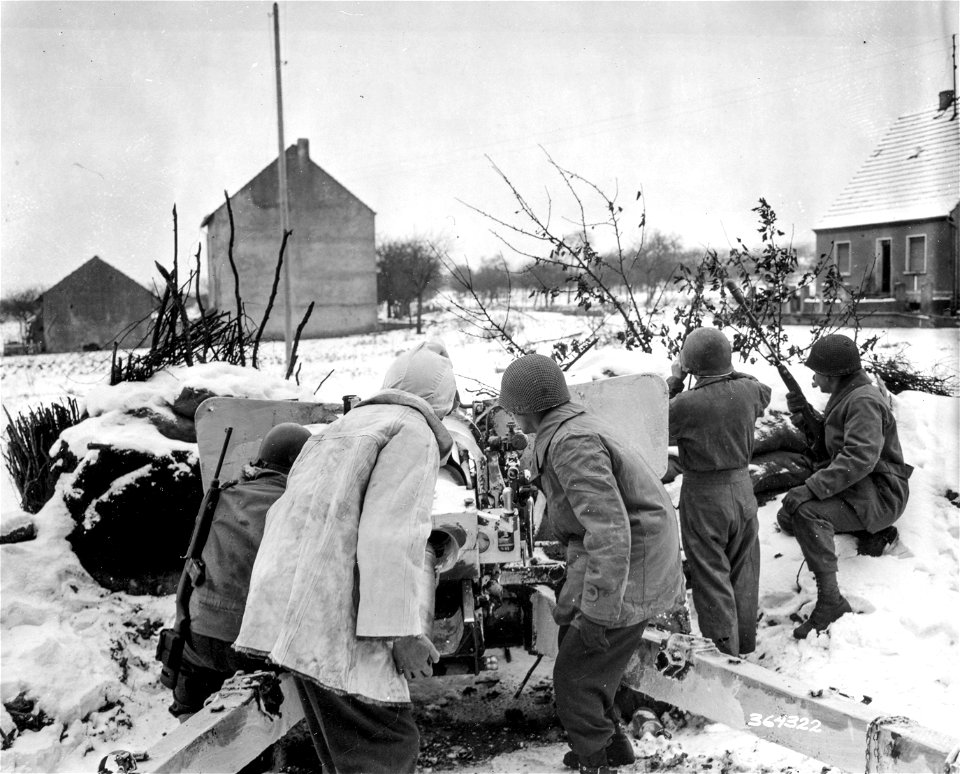 SC 364322 - The crew of a three-inch gun covers a front line road on which G-2 has reported 20 German tanks to be advancing.