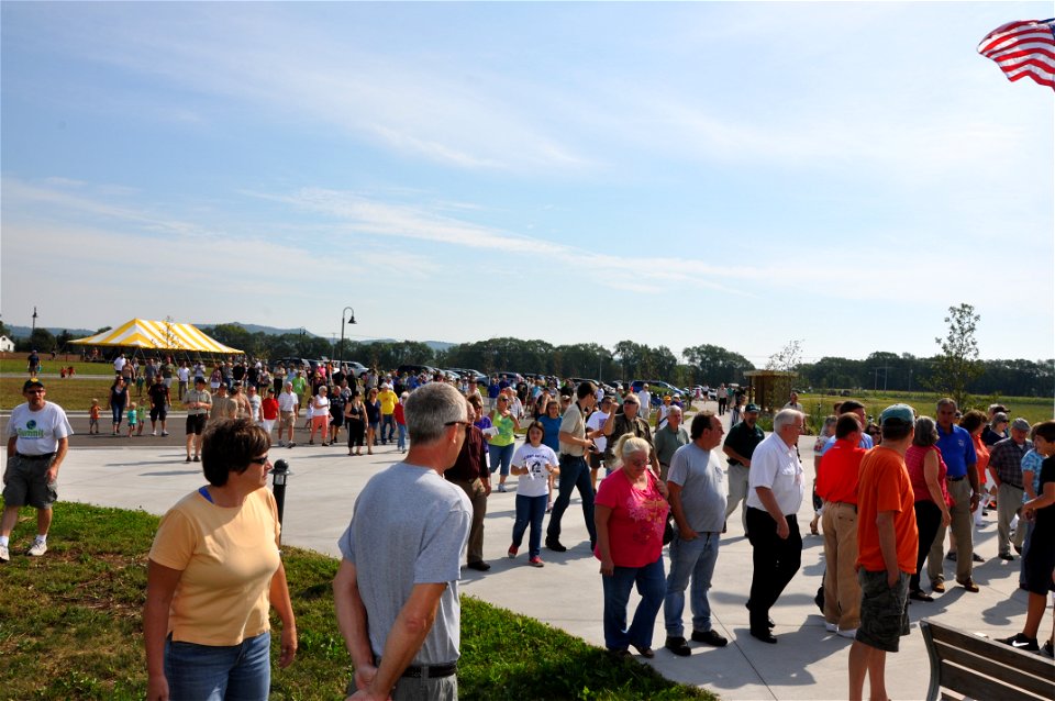 Crowd gathers for ribbon cutting
