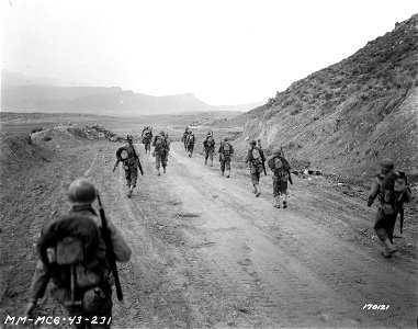 SC 170121 - 2nd Bn. 16th Inf., marching through the Kasserine Pass, on to Kasserine and Farriana. Visa looking out east toward Kasserine through the pass.