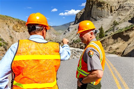 Yellowstone flood event 2022: Superintendent, Cam Sholly, and Chief of Facility Maintenance, Duane Bubac, looking at damage in Gardner River Canyon