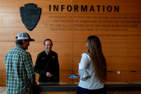 Craig Thomas and Discovery Visitor Center Ranger Answers Visitor Questions photo