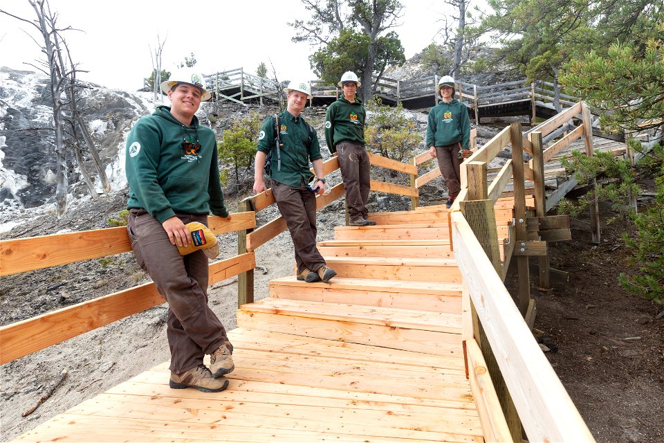 Montana Conservation Corps crew stands on the new stairs they built