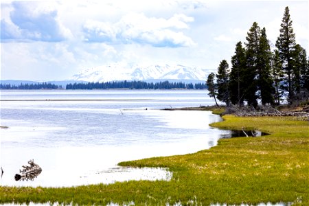 View from Pelican Creek outlet to Red Mountains photo