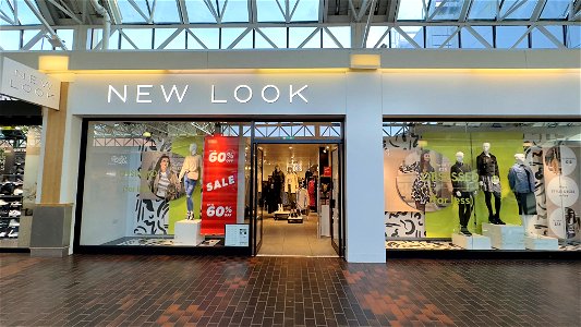New Look is a British global fashion retailer with a chain of high street shops. It was founded in 1969. The chain sells womenswear, menswear, and clothing for teens. photo
