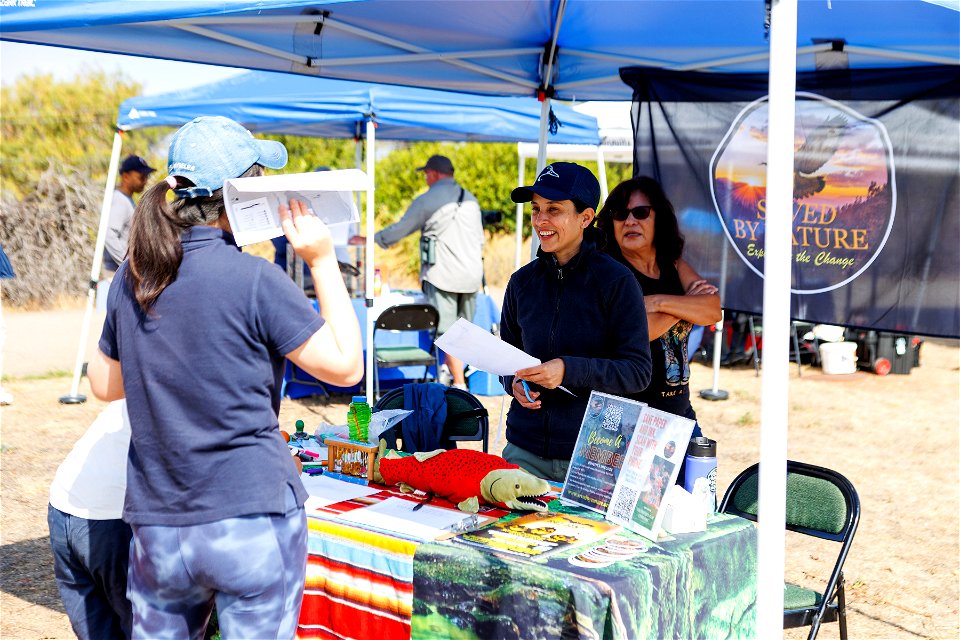 Attendees engage with partner booths
