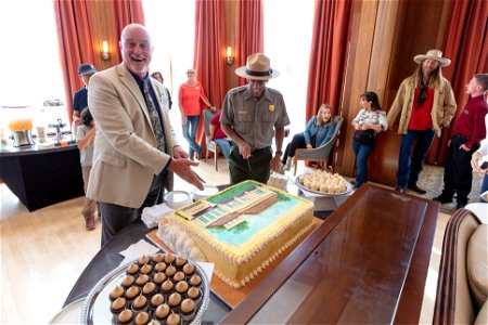 Mammoth Hot Springs Hotel reopening ceremony: Rick Hoeninghausen and Peter Galindo cut the cake