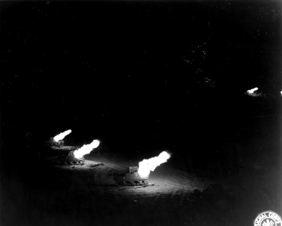 SC 329841 - C and D Troop, 10/65 Field Btry., 4/22 Field Regt., South African arty., 6th South African Arm'd Div., firing a mission.