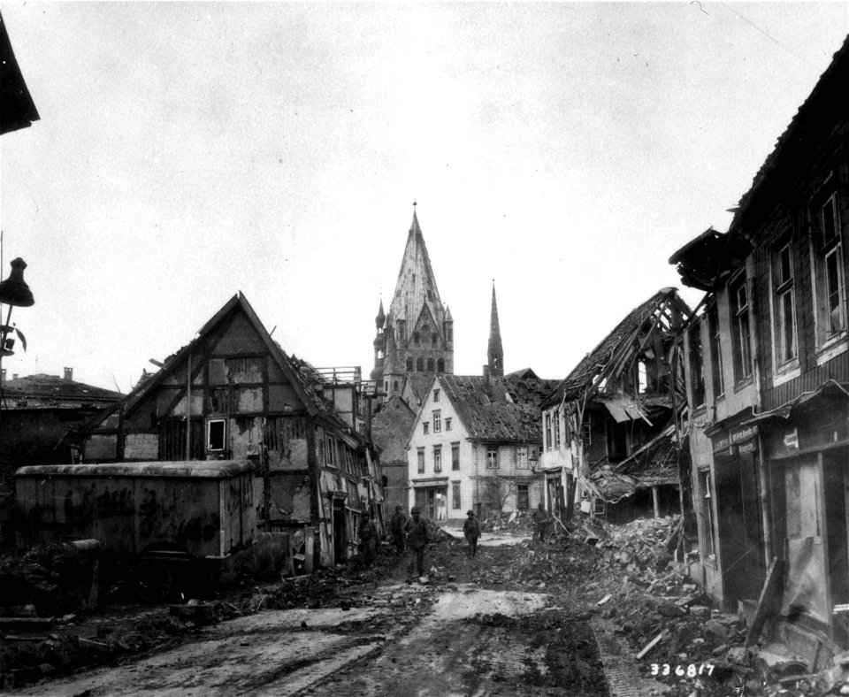 SC 336817 - Men of the 95th Division, U.S. Ninth Army, patrol the town of Soest after its capture. 7 April, 1945.