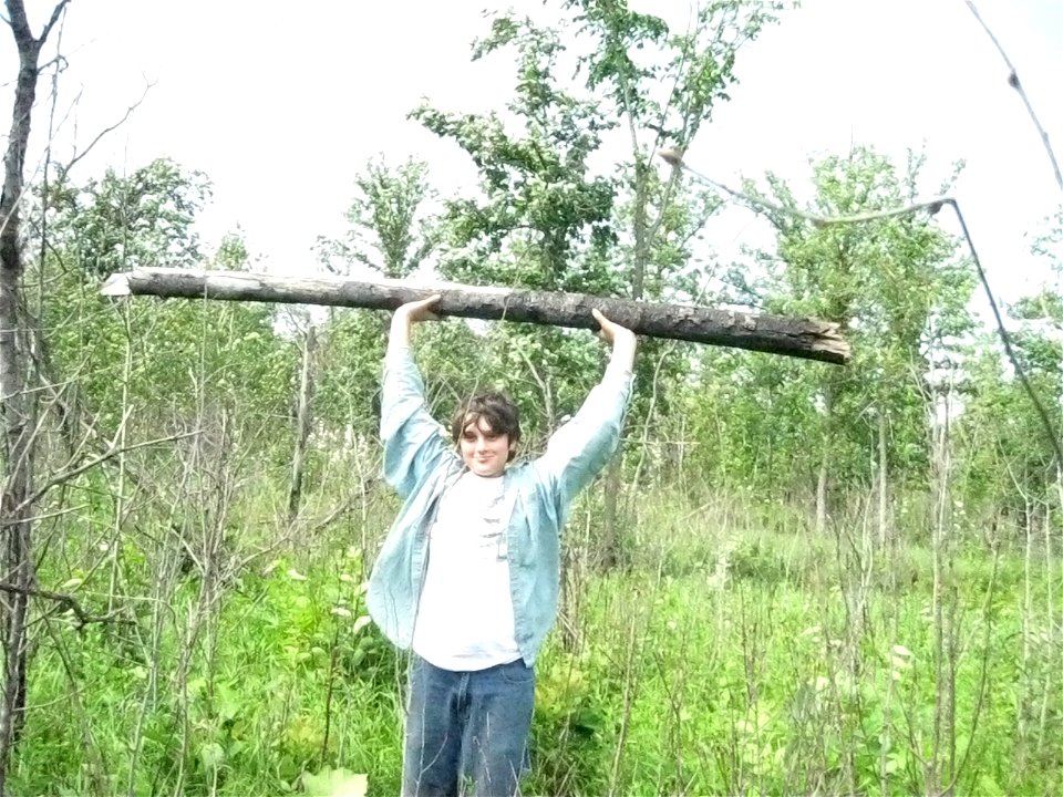 Ian and a aspen log at Agassiz