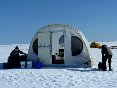 Setting up the weatherport in May photo