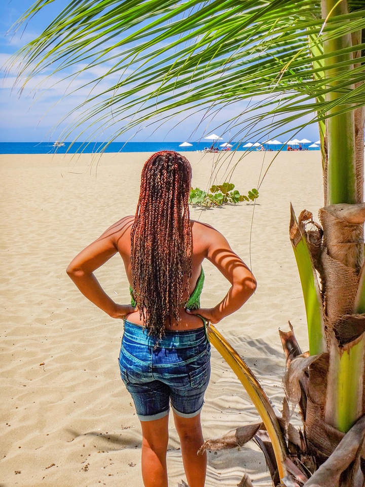 Woman braids people