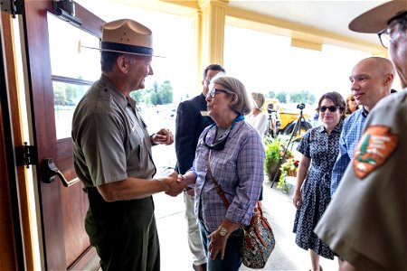 Mammoth Hot Springs Hotel reopening ceremony: Cam Sholly, Mike Keller, and Peter Galindo welcome people to the hotel (2)