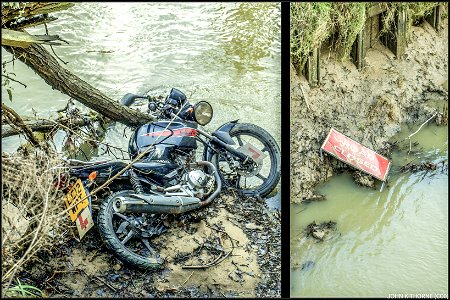 Things that don’t belong in The River Medway. Motorcycle & Road Closed Sign. Tidal river. The magnet fishing people will be in for a surprise. photo