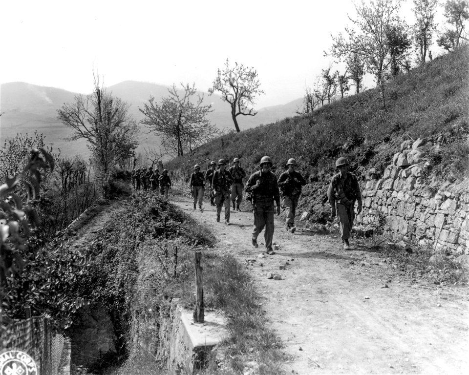 SC 270861 - 3rd Platoon, Co. G, 86th Inf. Regt., 10th Mt. Div., moving up to occupy the next hill after Mt. Valbura. 14 April, 1945.