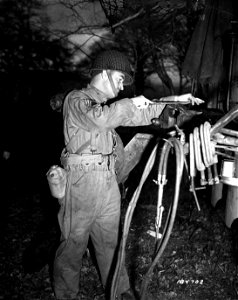 SC 184702 - M/Sgt. Chas Guthrie, 27, Roanoke, Va., member of a U.S. Ord. MM Bn. at work in the field;