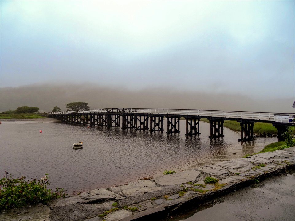 Penmaenpool toll bridge is a wooden toll bridge built in 1879 to replace a ferry crossing. It is Cadw-registered and Grade II listed.