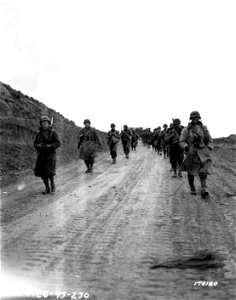 SC 170120 - 2nd Bn. 16th Infantry march through the Kasserine Pass, on to Kasserine and Farriana, Tunisia. photo