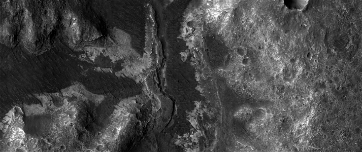 Possible Inverted Meanders in a Filled Channel to the West of Ladon Valles photo